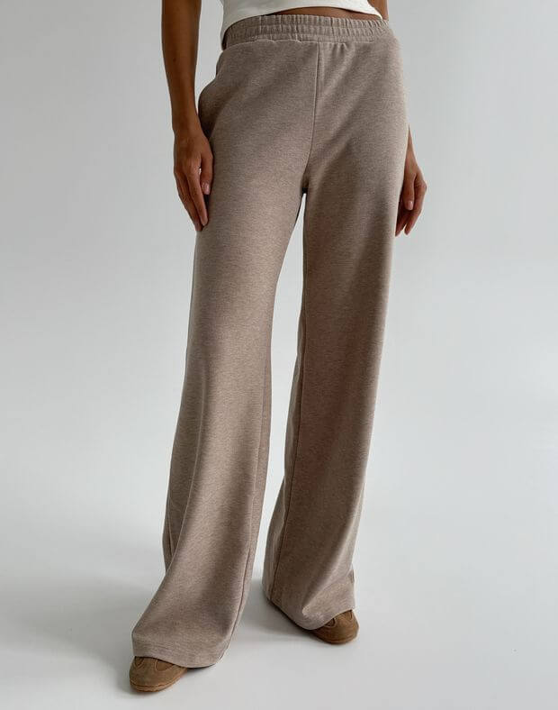 Штани трикотажні м'якої текстури широкого крою, бежеві - Фото 1